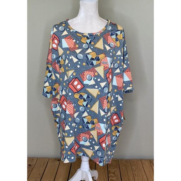 LuLaRoe Tops - NWT LulaRoe Patterned Irma Short Sleeve Top Size XL Women’s Multicolor